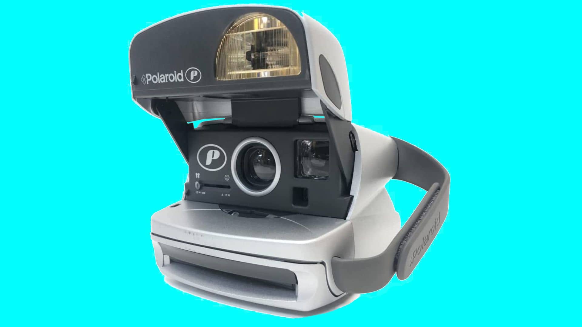 The Instax Mini Link 2 printer being used to print pictures on instant film